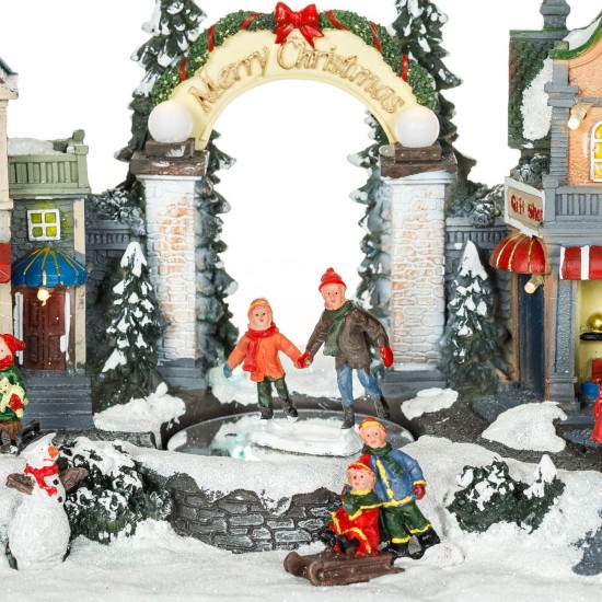 Scena de Craciun Magazine cu Copii Mos Craciun Lumina & Miscare 33x18x19cm