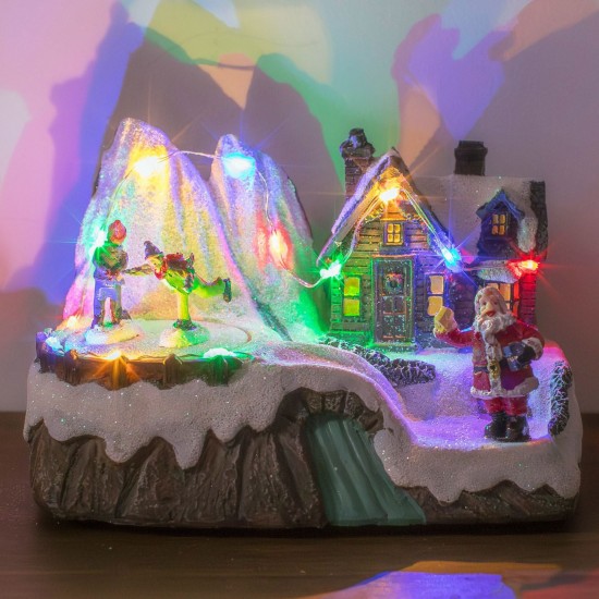 Scena de Craciun Patinoar cu Figurine Lumina Muzica & Miscare 16x10x11cm